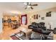 Open concept living space with eat-in kitchen with an attached seating area including fireplace at 8385 Briar Trace Dr, Castle Pines, CO 80108