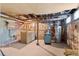 Unfinished basement with laundry hookups and exposed brick at 1340 N Gilpin St, Denver, CO 80218