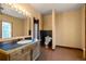 Bathroom with single sink vanity and tile flooring at 1340 N Gilpin St, Denver, CO 80218