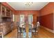 Dining room features hardwood floors and antique furniture at 1340 N Gilpin St, Denver, CO 80218