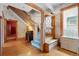 Elegant entryway with stained glass window and hardwood floors at 1340 N Gilpin St, Denver, CO 80218