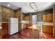 Galley kitchen with wood cabinets and island at 1340 N Gilpin St, Denver, CO 80218