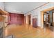 Built-in bookcase in the library with hardwood floors at 1340 N Gilpin St, Denver, CO 80218