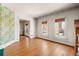 Spacious living room featuring hardwood floors and large windows at 1340 N Gilpin St, Denver, CO 80218