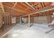 Unfinished basement framed and ready for customization, offering potential for additional living space at 796 S Bristol St, Lakewood, CO 80228