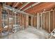 Basement awaiting finishing touches; framed walls and exposed utilities offer a blank canvas for customization at 796 S Bristol St, Lakewood, CO 80228