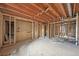 Partially finished basement showing framed walls, ready for transformation into a personalized living area at 796 S Bristol St, Lakewood, CO 80228