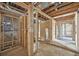 Framed basement featuring plumbing and electrical lines, offering the potential for a functional and adaptable space at 796 S Bristol St, Lakewood, CO 80228