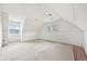 Large unfinished bedroom with sloped ceilings, offering design potential at 796 S Bristol St, Lakewood, CO 80228