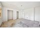 A bedroom being renovated with open closets, waiting for personalization and finishing touches at 796 S Bristol St, Lakewood, CO 80228