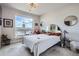 Bedroom with big window overlooking patio at 20 Wilcox St # 308, Castle Rock, CO 80104