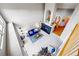 Open-concept living room features a fireplace, high ceilings, and elegant decor, perfect for relaxation at 3240 W 114Th Cir # D, Westminster, CO 80031