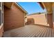 Open-air patio with wood flooring, featuring views of the townhome's exterior and the surrounding neighborhood at 3240 W 114Th Cir # D, Westminster, CO 80031
