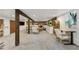 Large basement featuring a cozy seating area and dedicated workspace at 2765 W Denver Pl, Denver, CO 80211