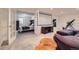 Finished basement features a movie screen, TV, and bedroom with french doors at 3775 S Green Ct, Englewood, CO 80110