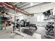 Bright basement featuring exercise equipment with storage and shelving units at 16975 Melody Dr, Broomfield, CO 80023