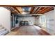 Spacious unfinished basement featuring exposed ceiling, rug and a window providing ample natural light at 4164 E 135Th Pl, Thornton, CO 80241