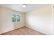 Bedroom with a large window offers natural light and a calm atmosphere for restful sleep at 4164 E 135Th Pl, Thornton, CO 80241