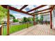Inviting backyard deck with black railing, ideal for enjoying the private backyard views at 4164 E 135Th Pl, Thornton, CO 80241
