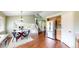 Dining area connecting to kitchen, featuring stainless steel refrigerator at 4164 E 135Th Pl, Thornton, CO 80241