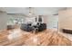 Spacious living room with hardwood floors, vaulted ceilings, and an open layout at 1367 Teller St, Lakewood, CO 80214