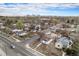 An aerial view of neighborhood showing home location and proximity to the city skyline at 2 S Knox Ct, Denver, CO 80219