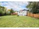 Picture of a well-maintained backyard with a wooden fence surrounding the perimeter at 2 S Knox Ct, Denver, CO 80219