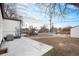 An expansive backyard featuring gravel and concrete, ready for outdoor living at 2 S Knox Ct, Denver, CO 80219