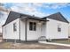 Charming home featuring a neutral color scheme and a well-maintained front yard at 2 S Knox Ct, Denver, CO 80219