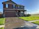 Beautiful two-story home with a spacious garage, stylish exterior, and well-maintained landscaping at 975 Alta St, Lochbuie, CO 80603