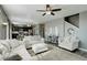 Open living room flowing into the kitchen and dining area, creating a great space for entertaining at 975 Alta St, Lochbuie, CO 80603