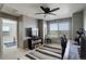 Cozy loft with ceiling fan, desk, and bookshelf, ideal for a home office or study area at 975 Alta St, Lochbuie, CO 80603