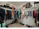 Spacious walk-in closet with ample storage space for clothes, shoes, and accessories at 975 Alta St, Lochbuie, CO 80603