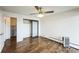 Bedroom with closet, wood floors and ceiling fan at 4600 E Asbury Cir # 210, Denver, CO 80222