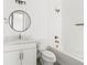 Cozy bathroom featuring a vanity, toilet, and shower with modern fixtures at 39441 Stockton Cir, Elizabeth, CO 80107
