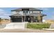 Beautiful two-story home with a modern design, spacious garage, and well-manicured lawn at 39441 Stockton Cir, Elizabeth, CO 80107