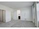 Neutral bedroom with a walk-in closet and carpeting at 11063 Shining Star Cir, Parker, CO 80134