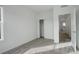 Bright bedroom with neutral carpet, white walls, and closet at 11063 Shining Star Cir, Parker, CO 80134