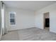 Neutral bedroom featuring soft carpeting, a window, and a closet at 11063 Shining Star Cir, Parker, CO 80134