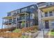 Charming townhome with a fenced front yard and covered entryway exudes curb appeal at 11063 Shining Star Cir, Parker, CO 80134