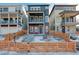 Charming two-story home features a fenced yard and inviting front entrance at 11063 Shining Star Cir, Parker, CO 80134