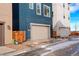 Modern townhome showcasing a two-car garage with well-maintained exterior and nearby street parking at 11063 Shining Star Cir, Parker, CO 80134
