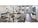 Bright, open living area with modern furnishings and a glass dining table offers space and style at 11063 Shining Star Cir, Parker, CO 80134