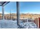 Picturesque patio view overlooking the landscape, featuring wood fencing and a rock garden at 11063 Shining Star Cir, Parker, CO 80134