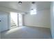 Carpeted basement area leading to the stairs and other finished spaces at 6190 Ivy St, Commerce City, CO 80022