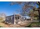 Exterior of home with new landscaping and renovated facade at 6190 Ivy St, Commerce City, CO 80022