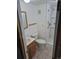 Cozy bathroom featuring a functional shower, toilet, and vanity at 2597 S Dillon St, Aurora, CO 80014