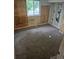 Bedroom with wall coverings and a window overlooking the neighborhood at 2597 S Dillon St, Aurora, CO 80014