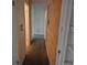 Hallway featuring access to multiple rooms in the house at 2597 S Dillon St, Aurora, CO 80014