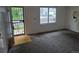 Spacious living room with a window overlooking the neighborhood at 2597 S Dillon St, Aurora, CO 80014